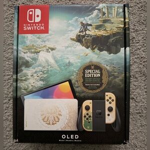 Zelda Special Edition Nintendo Switch OLED with Gold and Black Joy-Cons